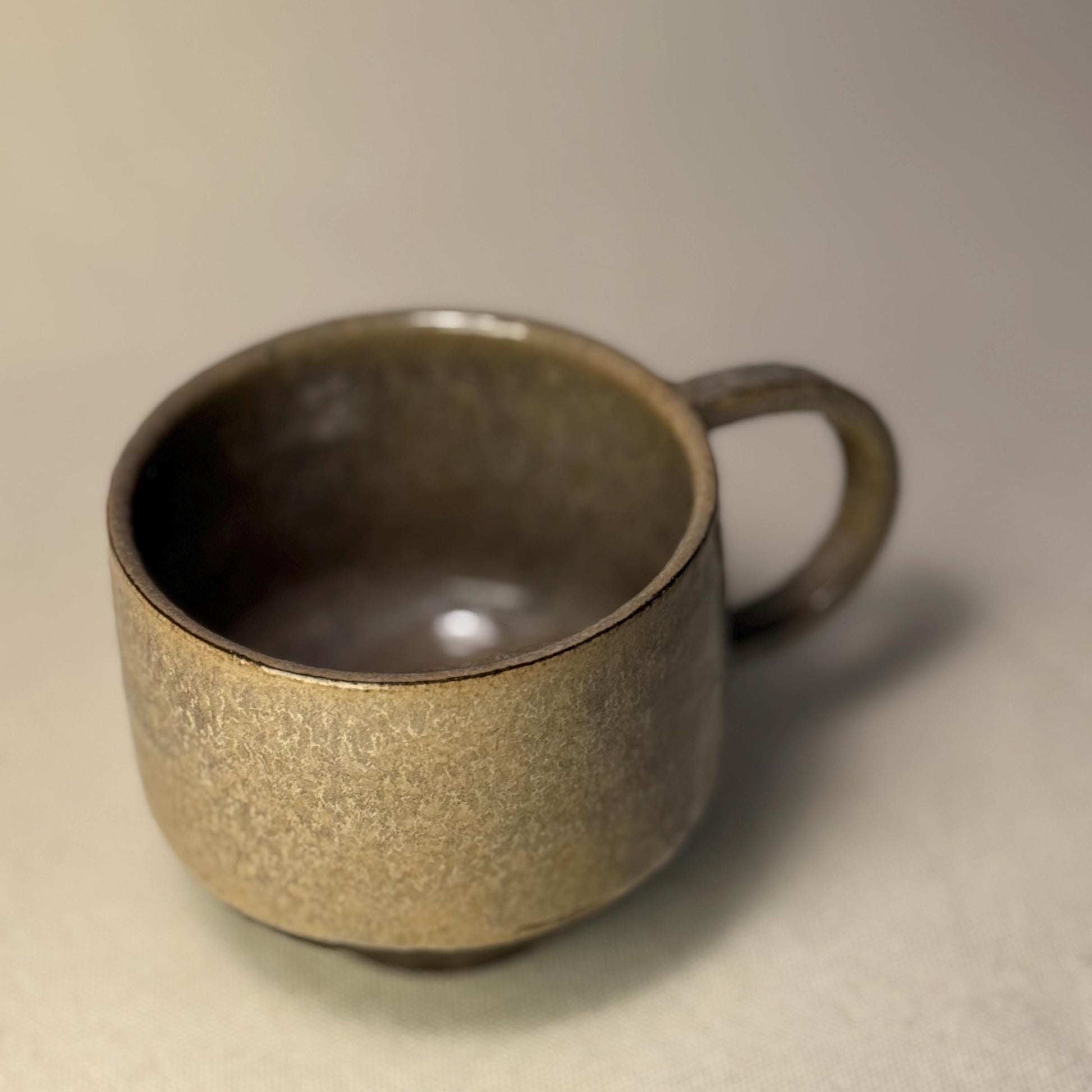 Handmade Stoneware Coffee Mug: Rustic Ceramic Pottery, Eclipse Eye Design